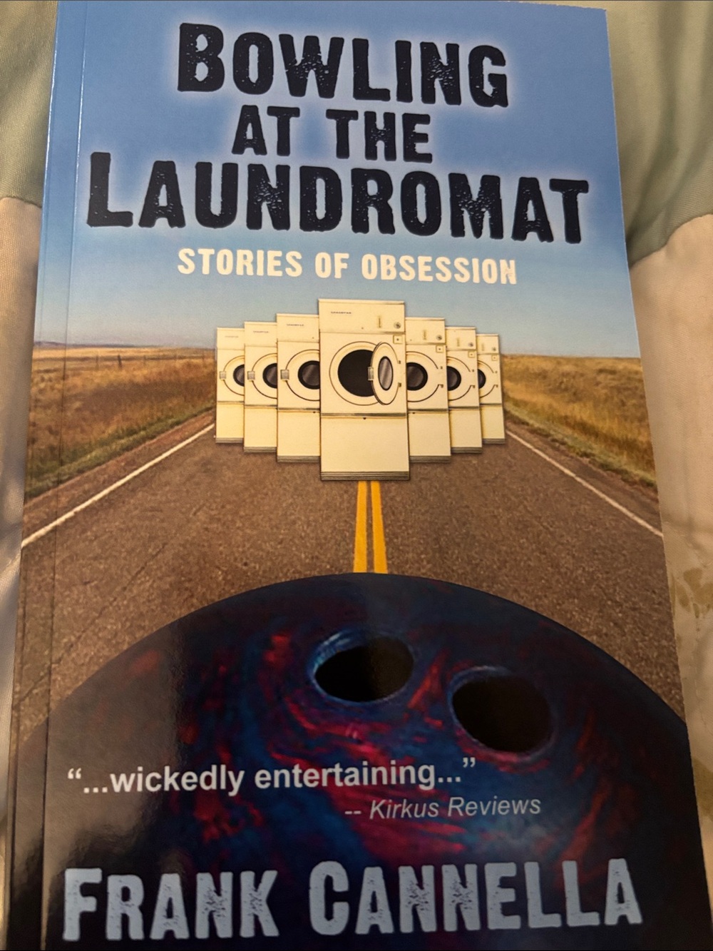 Bowling at the Laundromat: Stories of Obsession written by Frank Cannella